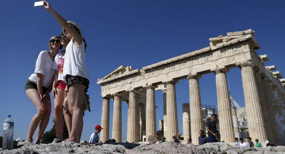 DW: Προς νέο ρεκόρ οδεύει ο ελληνικός τουρισμός